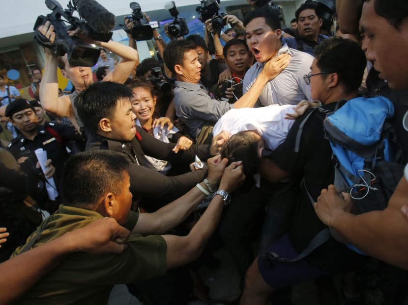 Gallery: Thai year-old coup imposes superficial calm but little else