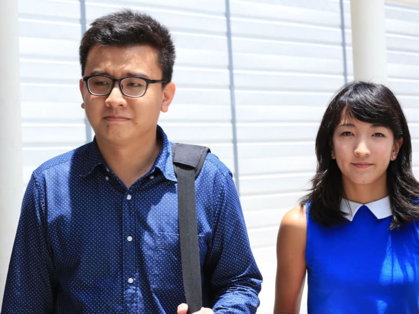 The duo behind The Real Singapore, Ai Takagi (right) and Yang Kaiheng (left) arriving at court on Apr 14, 2015. TODAY file photo