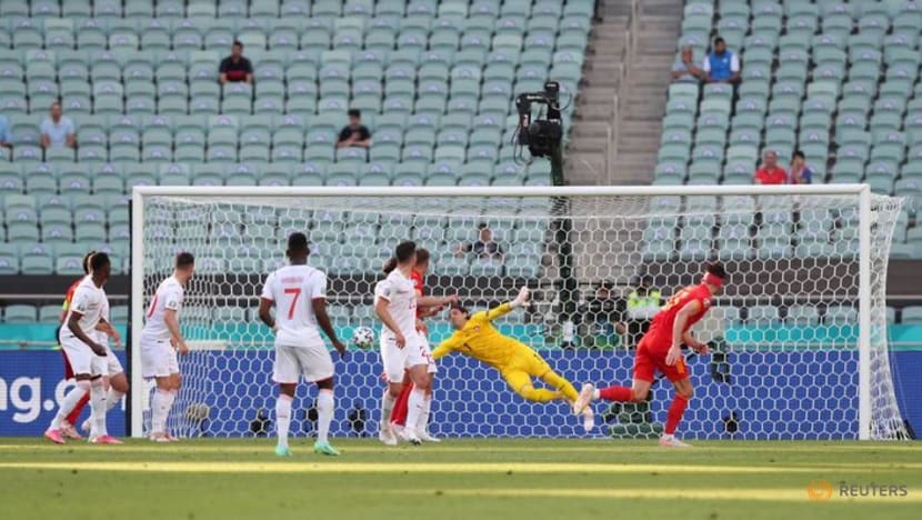 Soccer-Moore snatches point for Wales against wasteful Swiss Soccer-Moore snatches point for Wales against wasteful Swiss