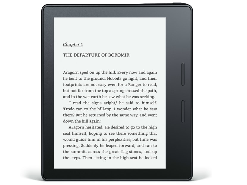 This photo provided by Amazon shows Amazon’s latest Kindle. Amazon says the new Kindle is 30 percent thinner and 20 percent lighter than previous Kindles. It’s also asymmetrical, with a grip on one side for one-handed reading. Photo: Amazon via AP