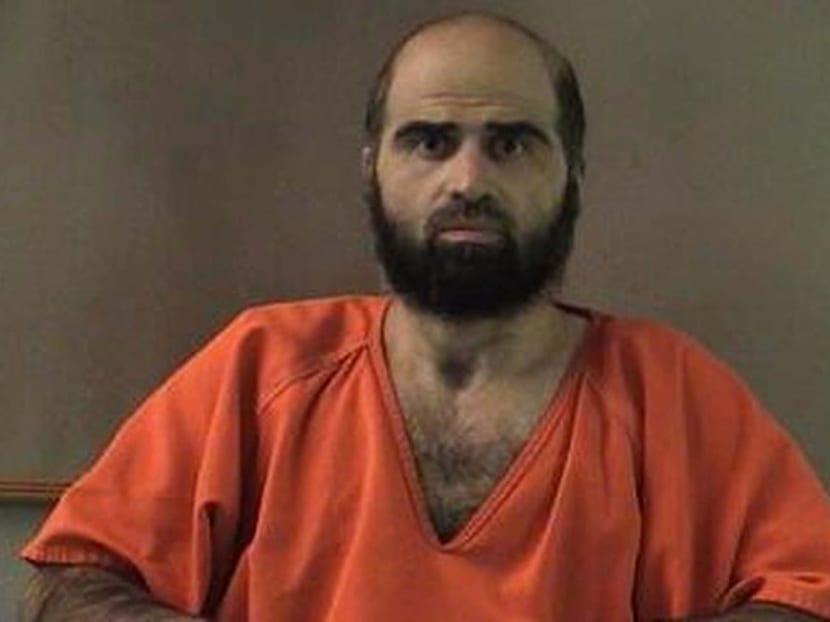 Nidal Hasan, charged with killing 13 people and wounding 31 in a November 2009 shooting spree at Fort Hood, Texas, is pictured in an undated Bell County Sheriff's Office photograph. Photo: Reuters/Bell County Sheriff's Office