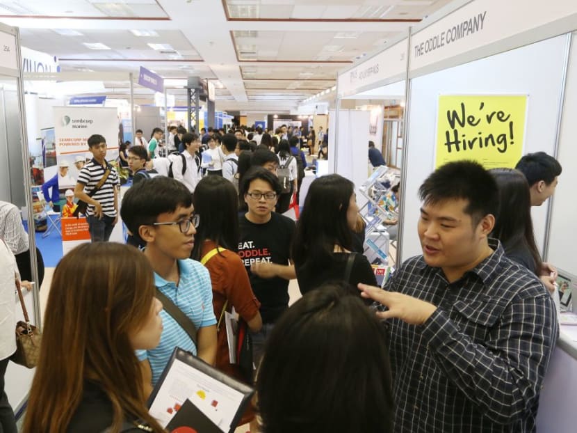 Visitors at the NUS Career Fair. Graduates from the university have made the list of the world’s top 10 most employable, according to a global survey of recruiters.