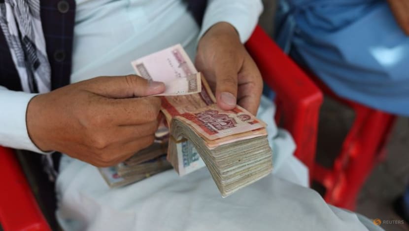 Running out of dollars, Afghan banks ask Taliban for more cash Running out of dollars, Afghan banks ask Taliban for more cash