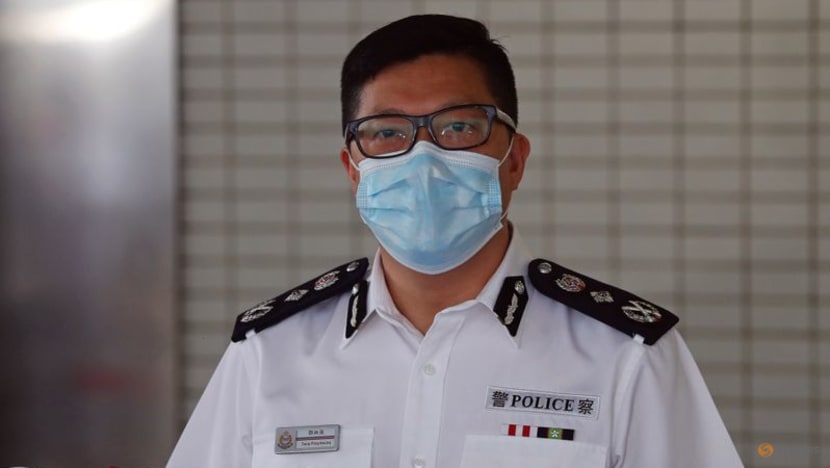Hong Kong security chief steps up pressure on city's main press group