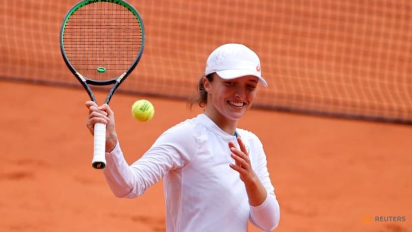 Swiatek powers past Podoroska to reach first Grand Slam final Swiatek powers past Podoroska to reach first Grand Slam final