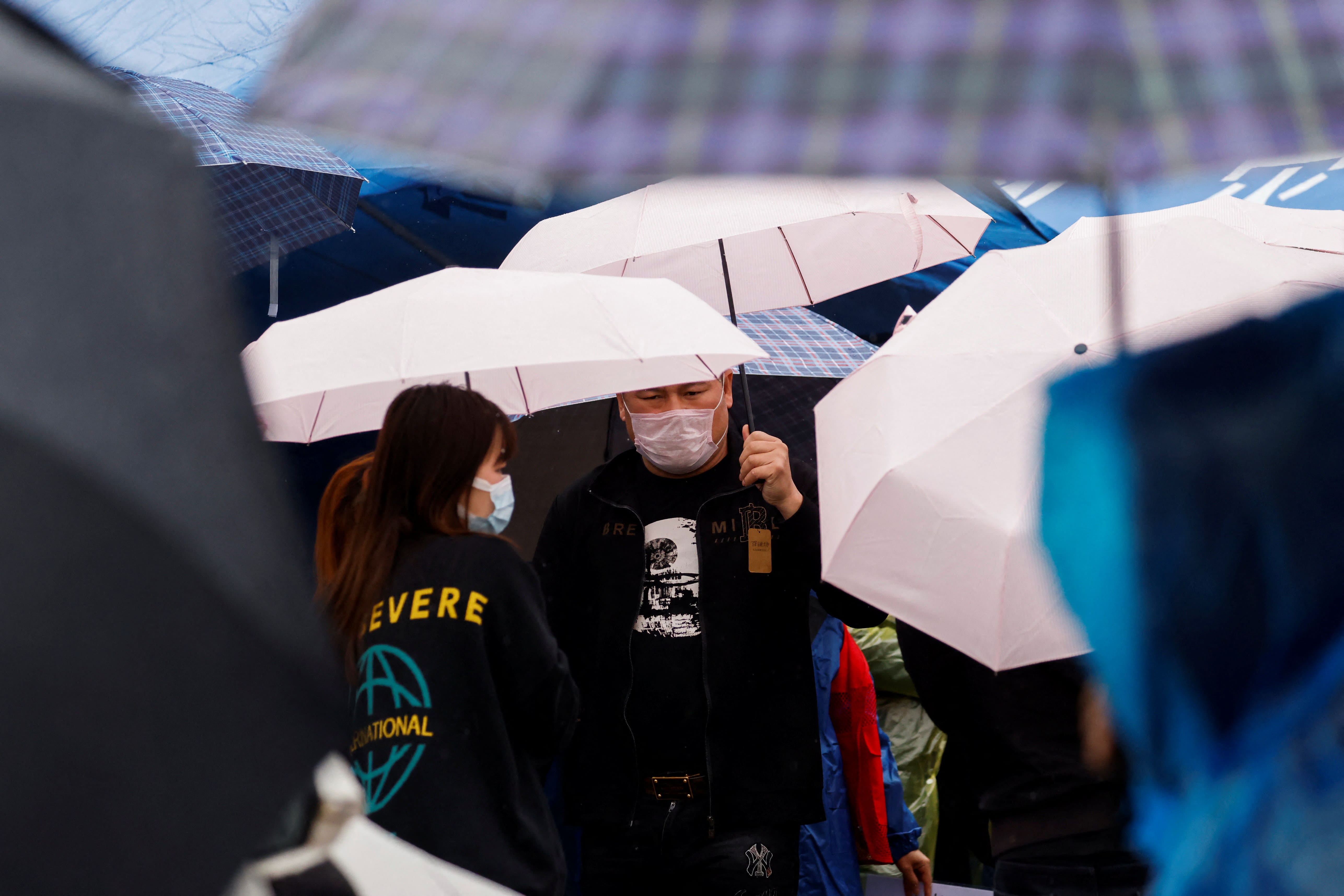 A relative of a victim stands at the entrance of Lu village near the site where a China Eastern Airlines Boeing 737-800 plane flying from Kunming to Guangzhou crashed, in Wuzhou, Guangxi Zhuang Autonomous Region, China on March 23, 2022.
A relative of a victim stands at the entrance of Lu village near the site where a China Eastern Airlines Boeing 737-800 plane flying from Kunming to Guangzhou crashed, in Wuzhou, Guangxi Zhuang Autonomous Region, China on March 23, 2022.