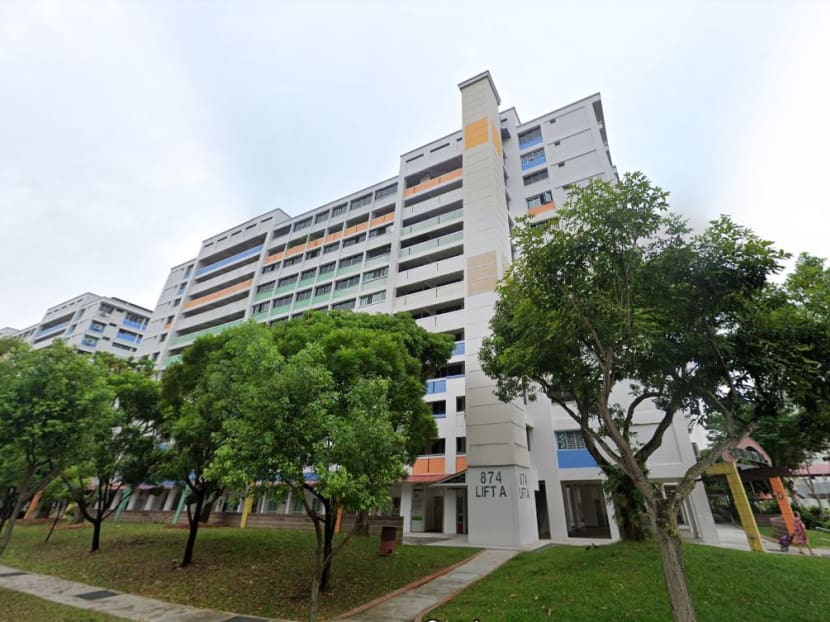 A view of the public housing block in Yishun where a woman was reported to have fallen to her death on Oct 12, 2023.
