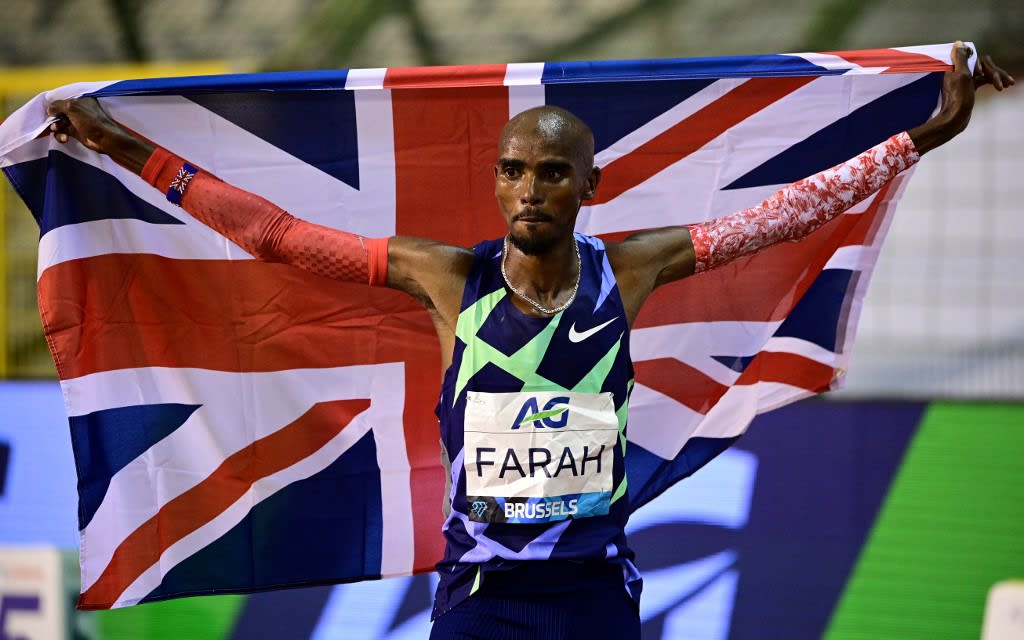 Britain's Mo Farah celebrates after victory and a world record in the men's one hour event at The Diamond League AG Memorial Van Damme athletics meeting at The King Baudouin Stadium in Brussels on Sept 4, 2020.<br />
Britain's Mo Farah celebrates after victory and a world record in the men's one hour event at The Diamond League AG Memorial Van Damme athletics meeting at The King Baudouin Stadium in Brussels on Sept 4, 2020.<br />
