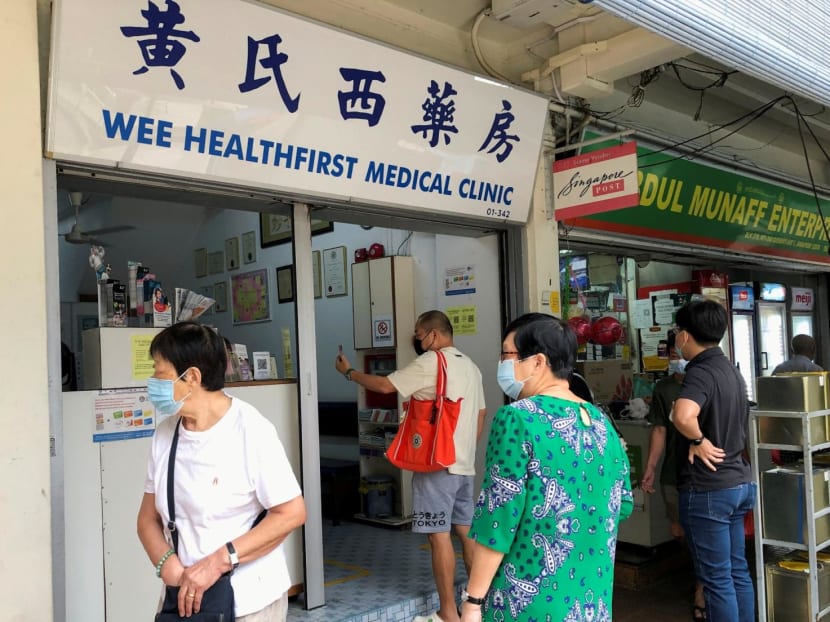 People waiting outside a general practitioner clinic in Clementi.