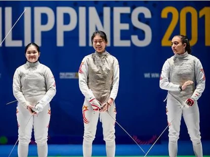 Fencers (from left to right) Tatiana Wong. Maxine Wong, Denyse Chan and Amita Berthier win gold in the women's team foil event at SEA Games 2019.