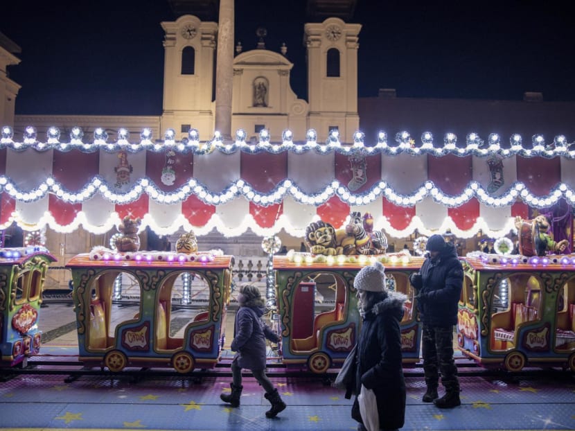 The Christmas market in Gyor, Hungary, Dec 13, 2022. Dimmed festive lighting at an annual market in the city of Gyor underscores the economic pain being felt across Hungary as energy costs and inflation soar. The Christmas market in Gyor, Hungary, Dec 13, 2022. Dimmed festive lighting at an annual market in the city of Gyor underscores the economic pain being felt across Hungary as energy costs and inflation soar.