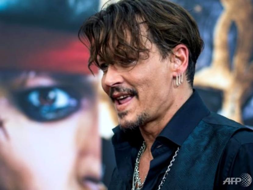 Johnny Depp reportedly dropped from Pirates Of The Caribbean Johnny Depp reportedly dropped from Pirates Of The Caribbean