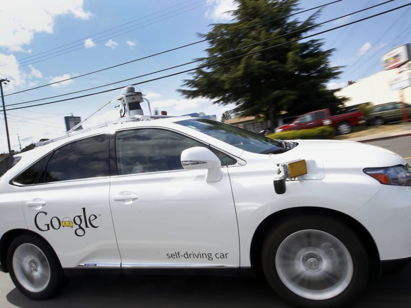 In this May 13, 2015, file photo, Google's self-driving Lexus car drives along a street during a demonstration at the Google campus in Mountain View, California. Photo: AP