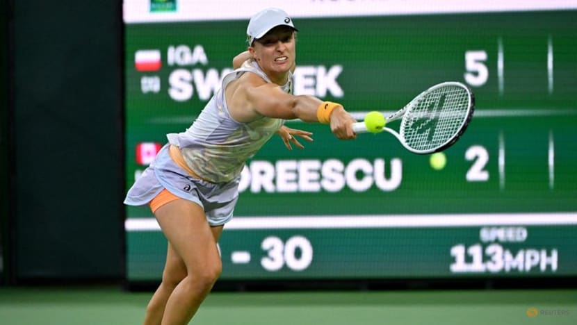 Swiatek quiets the chaos to advance at Indian Wells Swiatek quiets the chaos to advance at Indian Wells