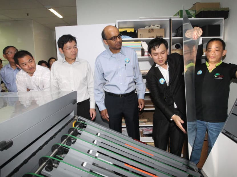 Deputy Prime Minister Tharman Shanmugaratnam visited local printing company, Asiawide Print Holdings on Jan 3, 2012 to see how small and medium enterprises embarked on their productivity drive. TODAY file photo
