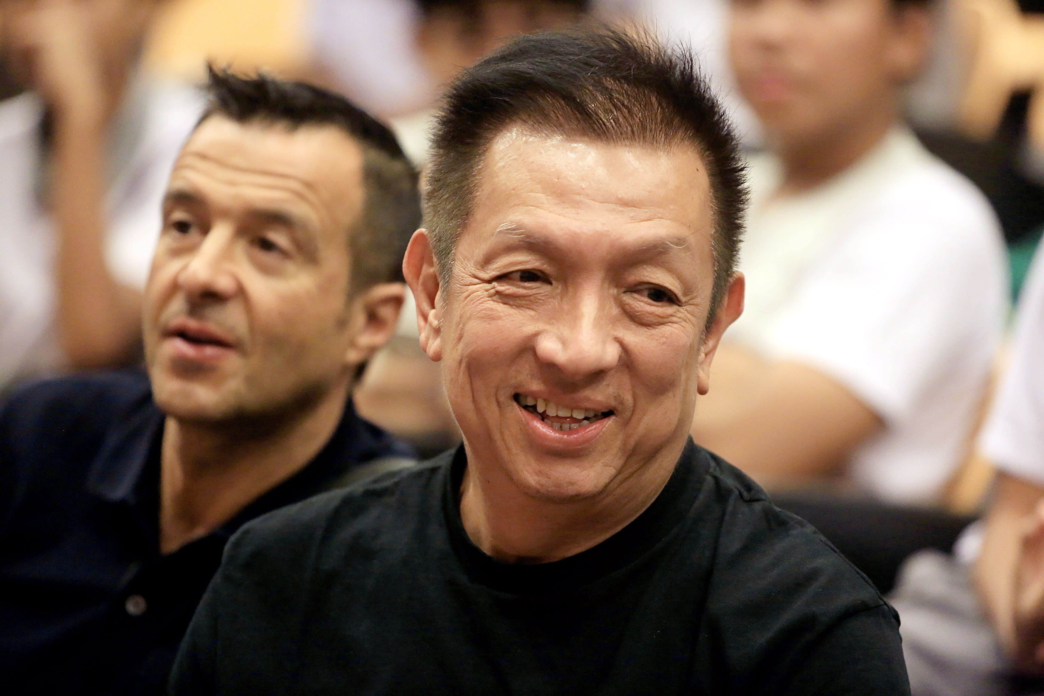 Mr Peter Lim (pictured in front), 69, has filed two police reports on June 20 and Aug 2, 2022 about people impersonating him online.