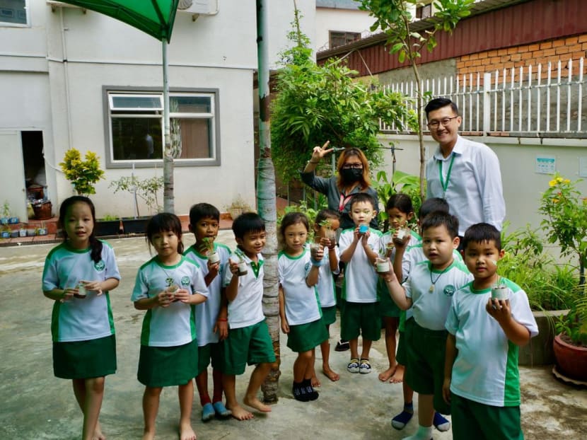 Mr Wang Junyong, 32, is a managing director of an international school in Cambodia. He is seen here with some K2 students and a teacher during an outdoor activity. Mr Wang Junyong, 32, is a managing director of an international school in Cambodia. He is seen here with some K2 students and a teacher during an outdoor activity.