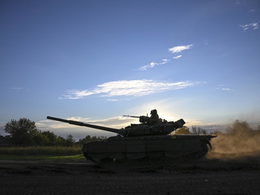 Ukrainian soldiers ride a tank in eastern Ukraine, on Sept 22, 2022, amid the Russian invasion of Ukraine.