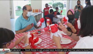 Heartland residents band together to decorate for National Day | Video
