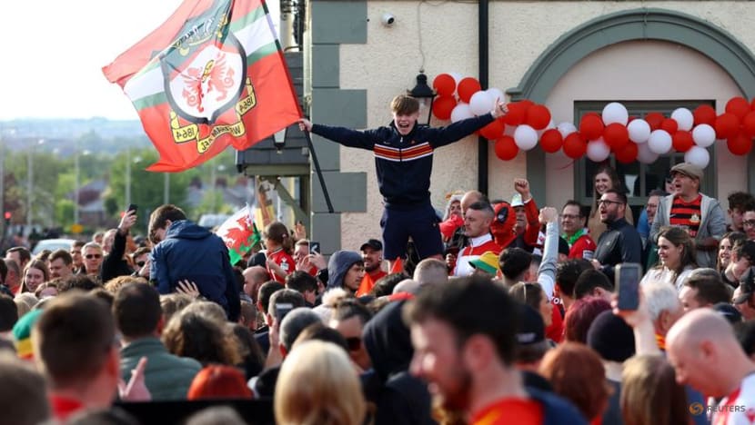 Wrexham paint town red with open-top bus parade after promotion to EFL