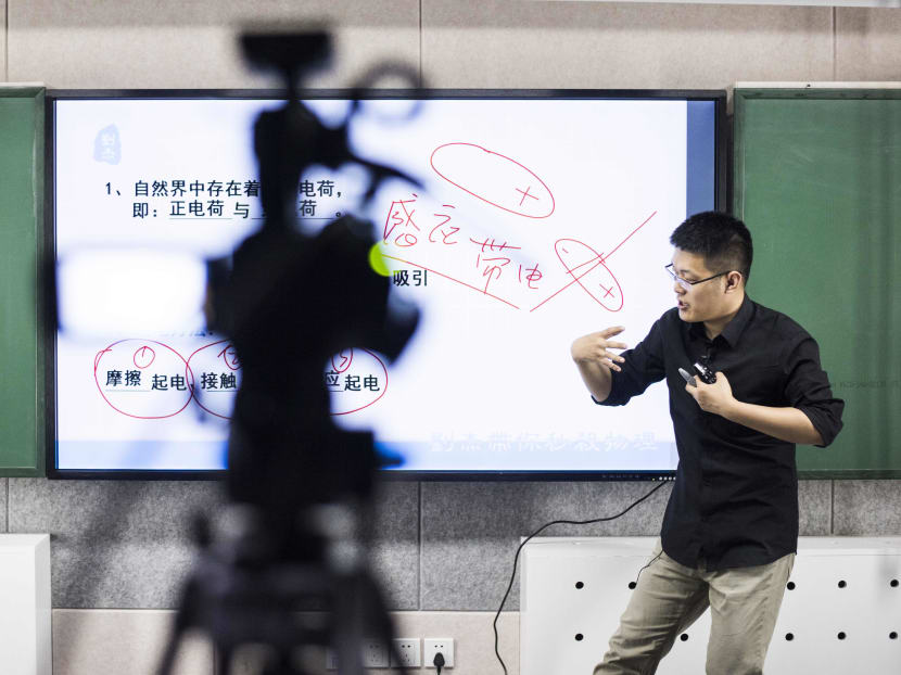 Chinese high school physics tutor Liu Jie gives an online lesson from a recording studio in Beijing. Photo: AFP