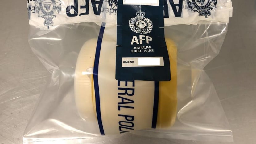 Malaysian man charged with trying to 'internally import' heroin pellets into Australia Malaysian man charged with trying to 'internally import' heroin pellets into Australia