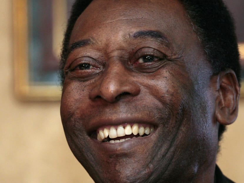 Brazilian soccer legend Pele smiles during a news conference in Hong Kong in this March 7, 2011 file photo. Photo: Reuters
