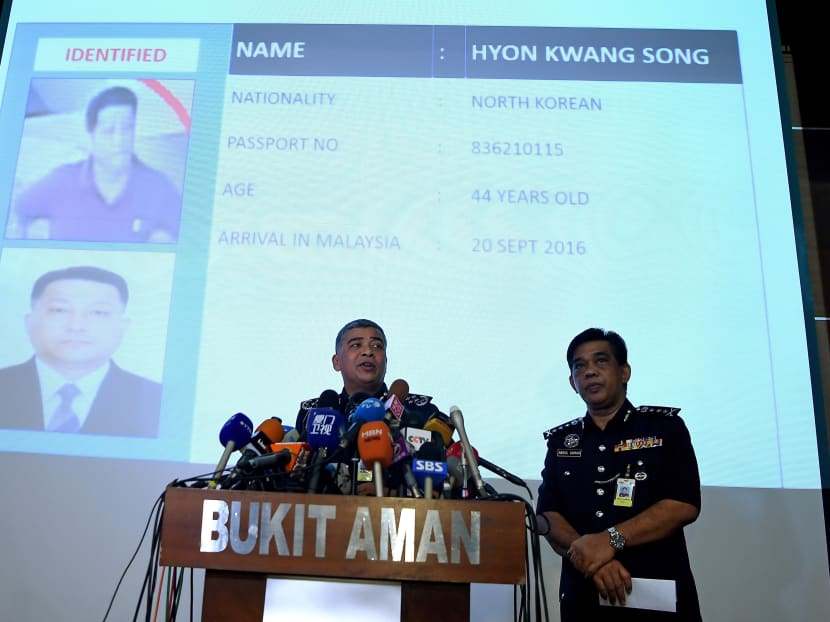 Royal Malaysian Police chief Khalid Abu Bakar (L) addresses journalists during a press conference in front of a screen, displaying the details of North Korean Embassy staff Hyon Kwong Song, at the Bukit Aman police headquarters in Kuala Lumpur on February 22, 2017, following the assassination of Kim Jong-nam, the half-brother of North Korean leader Kim Jong-Un. Photo: AFP