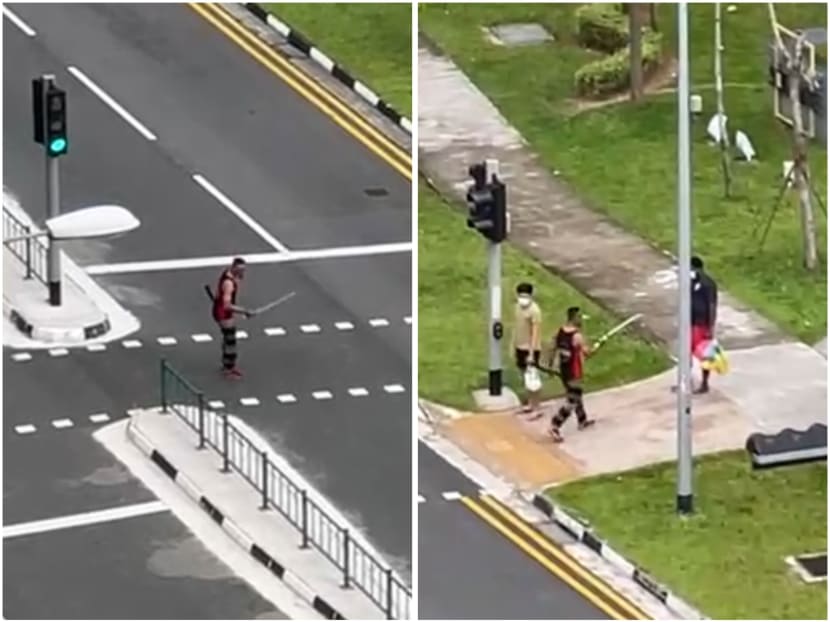 Video screengrabs showing the man swinging a sword towards several cars and  members of the public. 