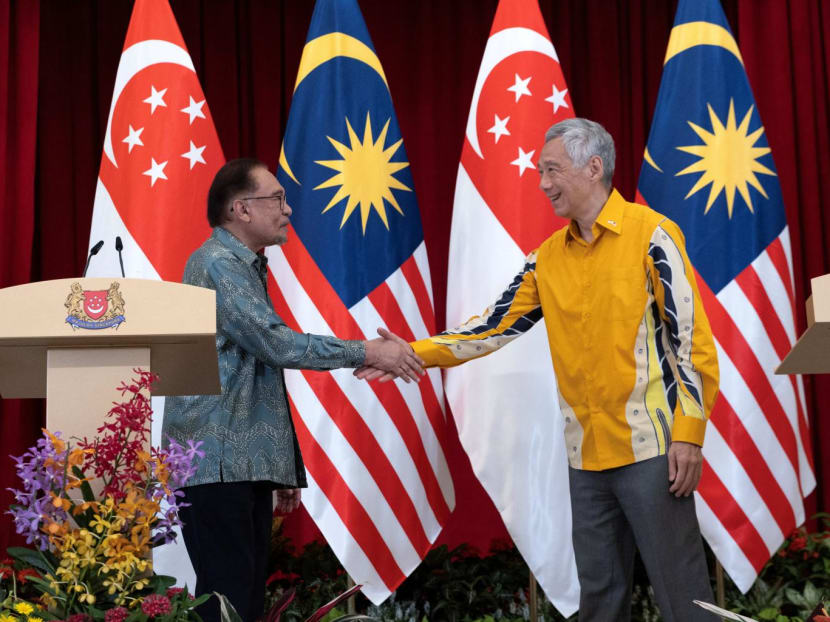 Prime Minister Lee Hsien Loong and his Malaysian counterpart Anwar Ibrahim shake hands after a joint press conference at the Istana on Oct 30, 2023, where they held their Leaders' Retreat. Prime Minister Lee Hsien Loong and his Malaysian counterpart Anwar Ibrahim shake hands after a joint press conference at the Istana on Oct 30, 2023, where they held their Leaders' Retreat.