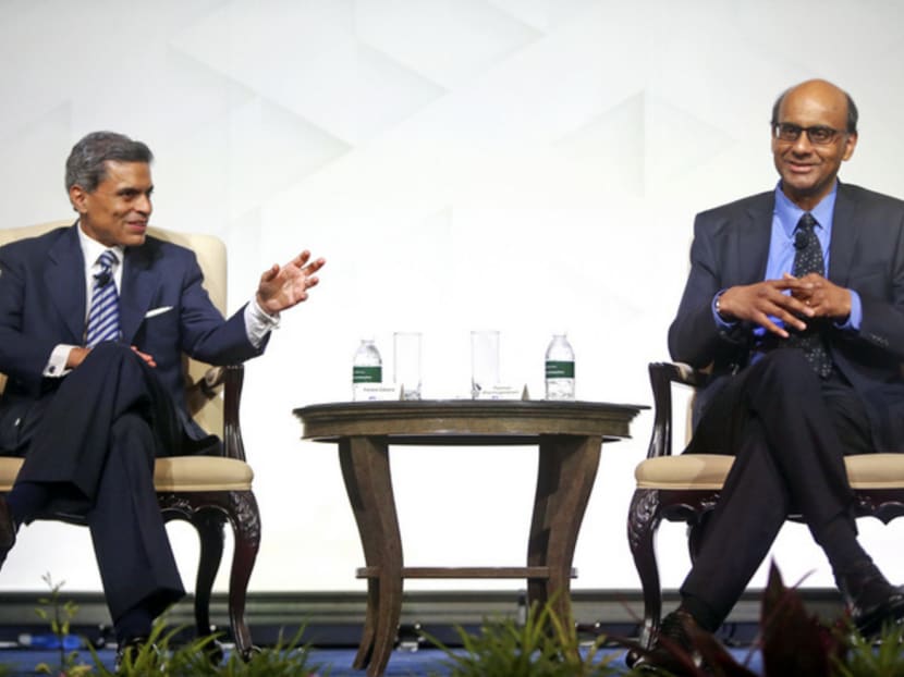 (L-R) Fareed Zakaria hosting a conversation with DPM Tharman Shanmugaratnam during the SG50+ Conference at the Shangri-La Hotel.