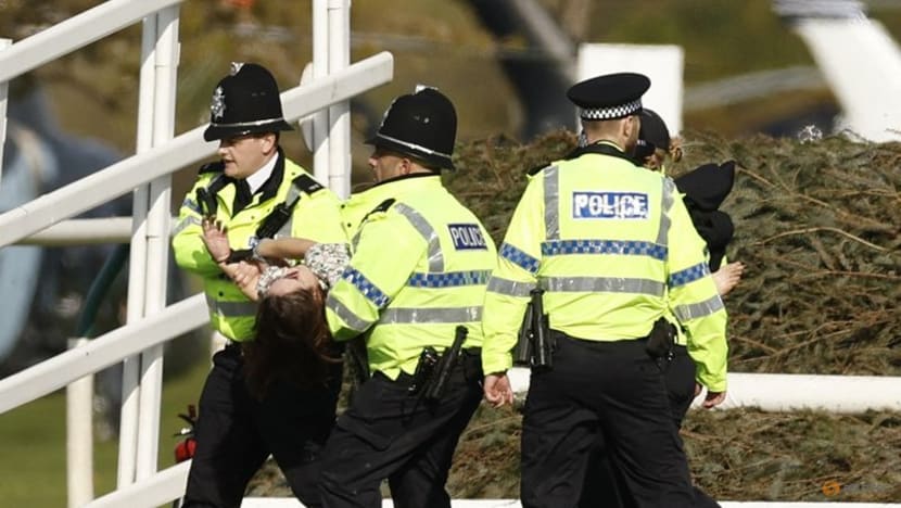 Protesters delay start of Britain's Grand National horse race Protesters delay start of Britain's Grand National horse race