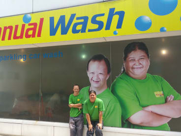 At the SPC Telok Blangah service station, the manual car wash facility is operated and managed by about 20 individuals from Minds.