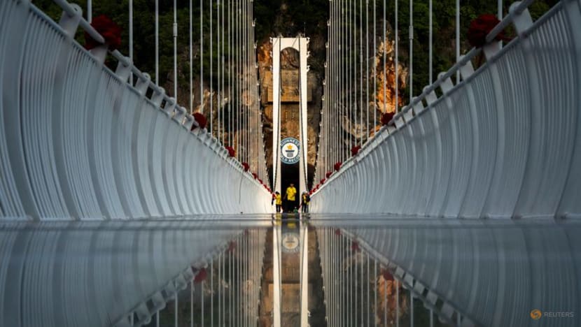 'Don't look down': Vietnam glass-bottomed bridge targets thrill-seekers