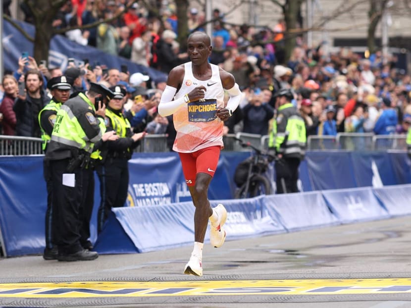 Eliud Kipchoge of Kenya crosses the finish line and takes sixth place in the professional Men's Division during the 127th Boston Marathon on April 17, 2023 in Boston, Massachusetts.