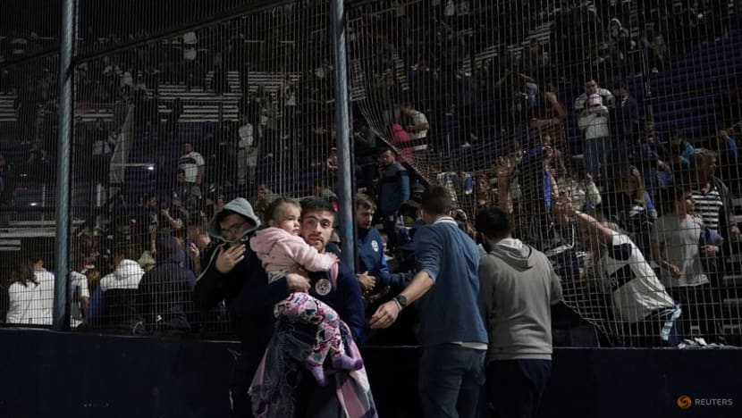 Football fan dies in Argentina, match abandoned as players forced off due to tear gas Football fan dies in Argentina, match abandoned as players forced off due to tear gas