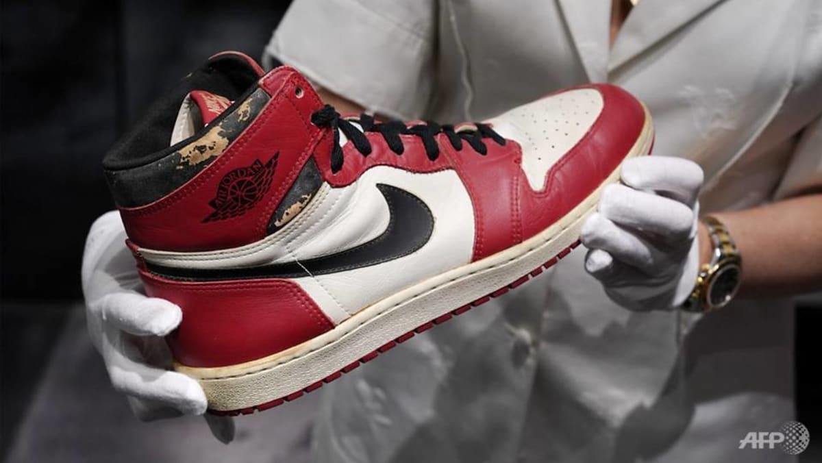 A pair of sneakers worn by Michael Jordan for US$615,000 - CNA