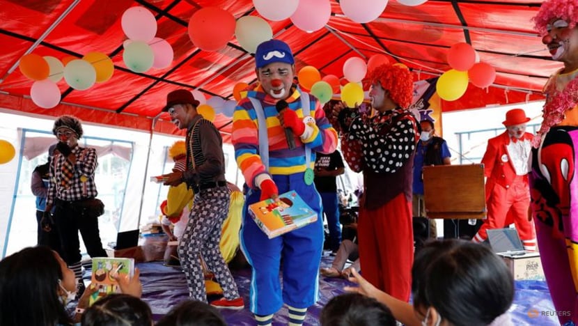 Indonesian clowns bring some cheer to children displaced by eruption Indonesian clowns bring some cheer to children displaced by eruption