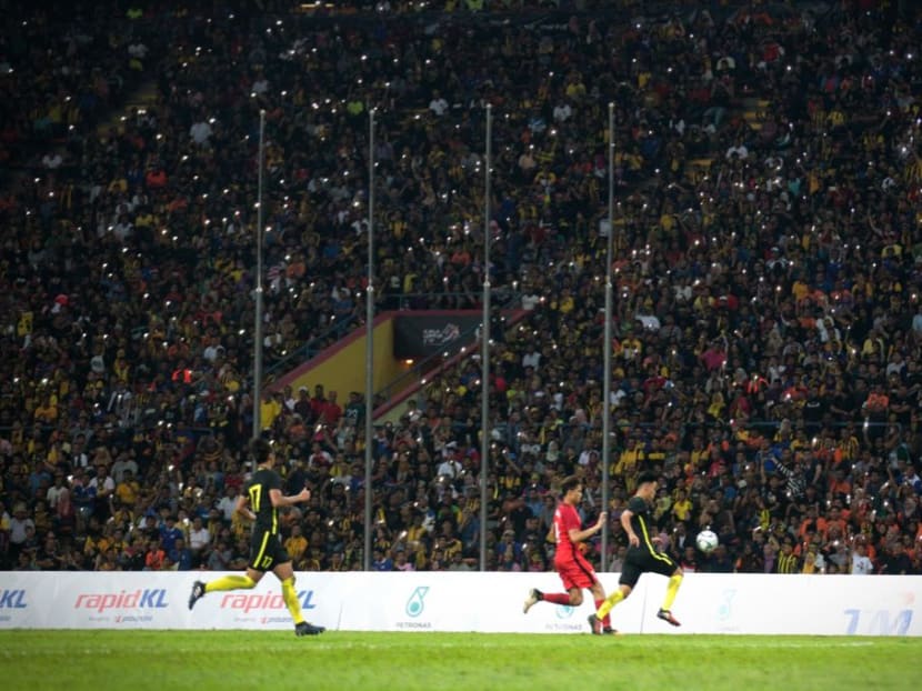 Fans at the Singapore vs Malaysia game. Photo: Jason Quah/TODAY