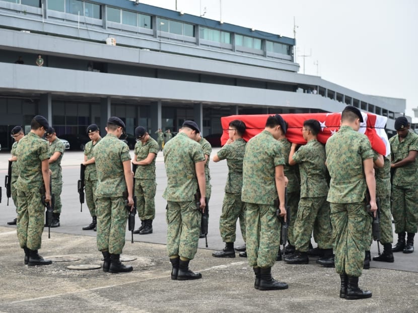 Gunners from the Artillery Formation paying their highest compliment to Corporal First Class (National Service) Aloysius Pang during the homecoming ramp ceremony.