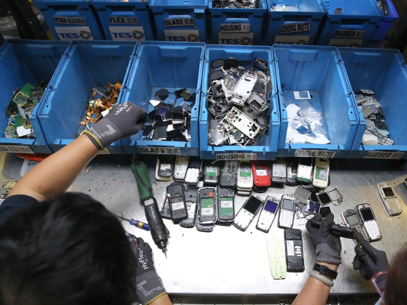 Demanufacturing works were seen at the demanufacturing area at the E-waste Recycling Facility at TES-AMM (Singapore) on Friday (Jan 19). Photo: Koh Mui Fong/TODAY