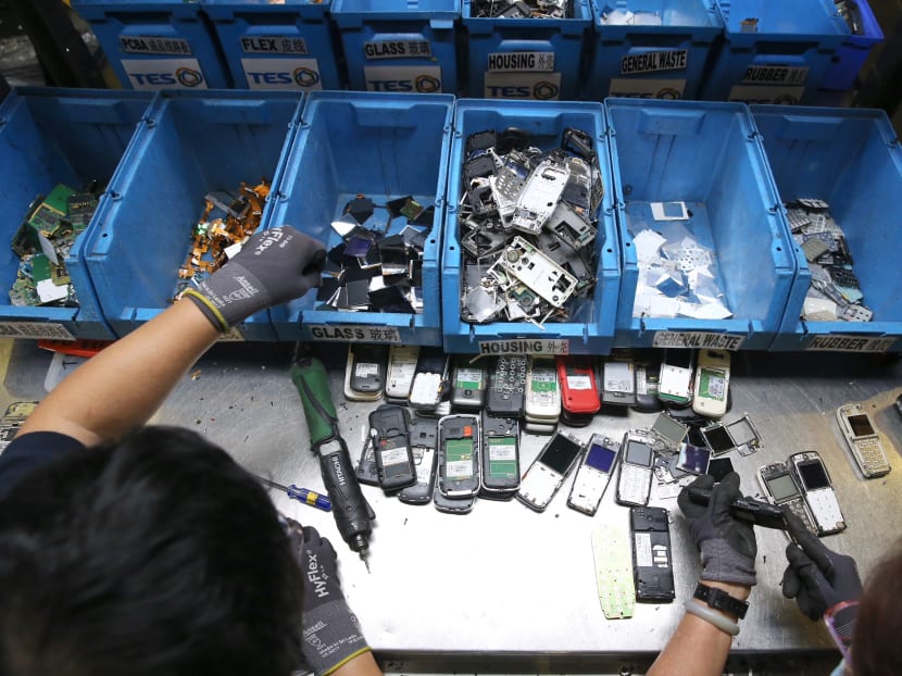 Demanufacturing works were seen at the demanufacturing area at the E-waste Recycling Facility at TES-AMM (Singapore) on Friday (Jan 19). Photo: Koh Mui Fong/TODAY Demanufacturing works were seen at the demanufacturing area at the E-waste Recycling Facility at TES-AMM (Singapore) on Friday (Jan 19). Photo: Koh Mui Fong/TODAY