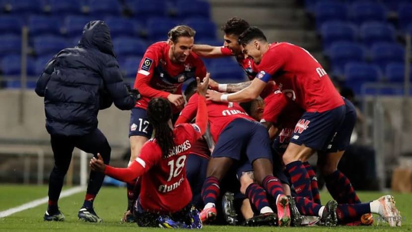 Football: Yilmaz double helps Lille regain top spot with comeback win at Lyon