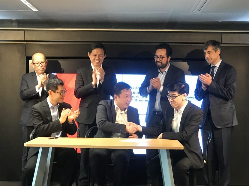 Trade Minister Chan Chun Sing witnessing the signing of the MOU between EDB Singapore, Enterprise Singapore and ESSEC Business School aimed at driving startup collaboration as part of the Global Innovation Alliance initiative.