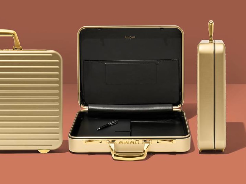 Elevate your business style with this classic Rimowa briefcase fashioned in gold