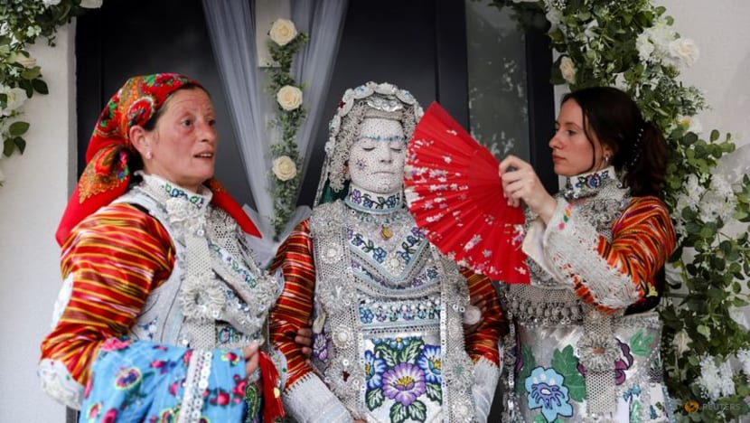 Face paint and folklore transform Chicago bride for traditional wedding in Kosovo Face paint and folklore transform Chicago bride for traditional wedding in Kosovo