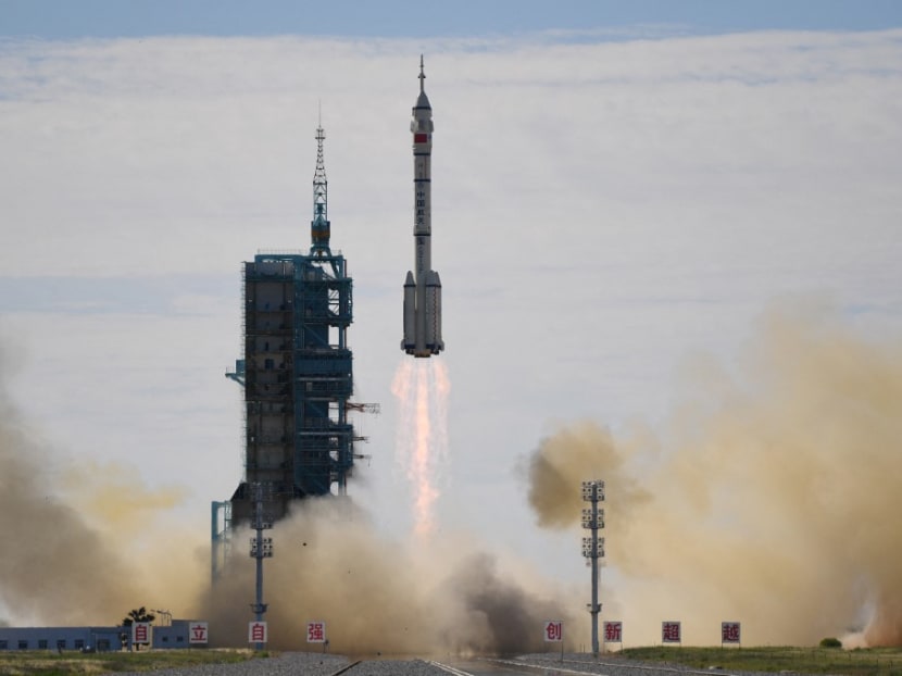 A Long March-2F carrier rocket, carrying the Shenzhou-12 spacecraft and a crew of three astronauts, lifts off from the Jiuquan Satellite Launch Centre in the Gobi desert in northwest China on June 17, 2021, the first crewed mission to China's new space station.