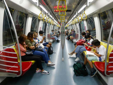 Commuters inside an MRT train on the Circle Line.