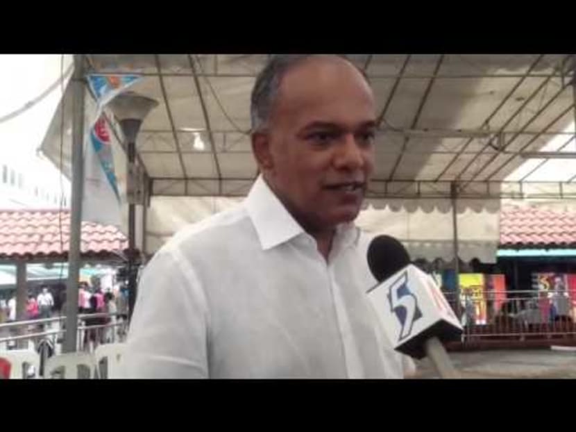 Minister K Shanmugam on town councils while on a walkabout at Nee Soon GRC