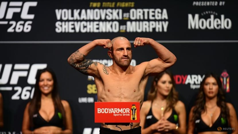 Mixed Martial Arts-Volkanovski, Shevchenko retain titles at UFC 266 Mixed Martial Arts-Volkanovski, Shevchenko retain titles at UFC 266